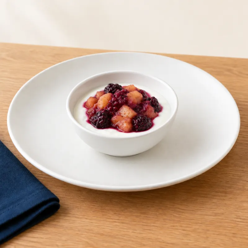 Natural yoghurt with apple and blackberry compote